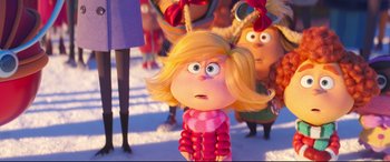 Movie still from “The Grinch” (2018), directed by Yarrow Cheney – A cartoon character's face in the snow; Medium shot, Over the shoulder angle
