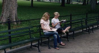 Movie still from “The Happening” (2008), directed by M. Night Shyamalan – Two women sitting on a bench in a park; Wide shot, High angle