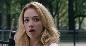 Movie still from “The Happening” (2008), directed by M. Night Shyamalan – A person with blonde hair and blue eyes; Close Up shot, Over the shoulder angle
