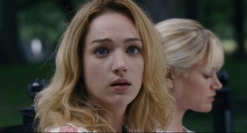 Movie still from “The Happening” (2008), directed by M. Night Shyamalan – A person with long blonde hair; Close Up shot, Over the shoulder angle