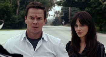 Movie still from “The Happening” (2008), directed by M. Night Shyamalan – A man and a woman standing next to each other on the side of a road; Close Up shot, Over the shoulder angle