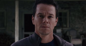 Movie still from “The Happening” (2008), directed by M. Night Shyamalan – A person wearing a jacket; Close Up shot, Low angle