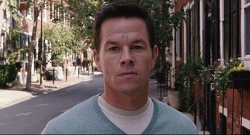 Movie still from “The Happening” (2008), directed by M. Night Shyamalan – A person wearing a sweater; Close Up shot, Over the shoulder angle