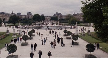 Movie still from “The Happening” (2008), directed by M. Night Shyamalan – A crowd of people walking around a park; Extreme Wide shot, High angle
