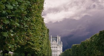 Movie still from “The Happening” (2008), directed by M. Night Shyamalan – A white building with a clock tower on top of it; Extreme Wide shot, Low angle