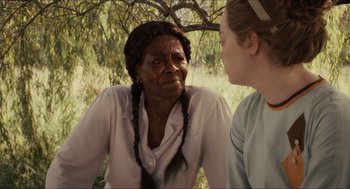 Movie still from “The Help” (2011), directed by Tate Taylor – A woman with braids talking to another woman; Close Up shot, Over the shoulder angle