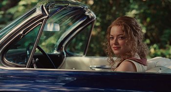 Movie still from “The Help” (2011), directed by Tate Taylor – A woman sitting in the driver's seat of a car; Medium shot, Over the shoulder angle