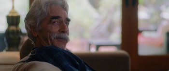Movie still from “The Hero” (2017), directed by Brett Haley – An older man sitting on a couch with his eyes closed; Close Up shot, Over the shoulder angle