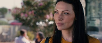 Movie still from “The Hero” (2017), directed by Brett Haley – A person with long black hair; Close Up shot, Over the shoulder angle
