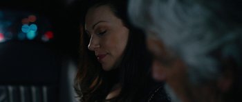 Movie still from “The Hero” (2017), directed by Brett Haley – A woman's face as she looks down; Close Up shot, Over the shoulder angle