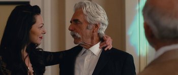 Movie still from “The Hero” (2017), directed by Brett Haley – An older man with white hair and a white beard; Close Up shot, Over the shoulder angle