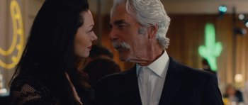Movie still from “The Hero” (2017), directed by Brett Haley – An older man and a younger woman in formal wear; Close Up shot, Over the shoulder angle