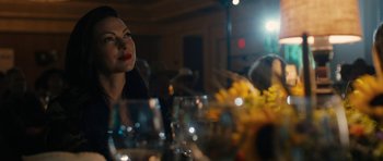 Movie still from “The Hero” (2017), directed by Brett Haley – A person sitting at a table; Close Up shot, Over the shoulder angle