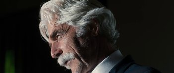 Movie still from “The Hero” (2017), directed by Brett Haley – An older man with white hair and a white beard; Close Up shot, Low angle