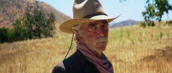Movie still from “The Hero” (2017), directed by Brett Haley – An old man with a beard and a hat; Close Up shot, Low angle