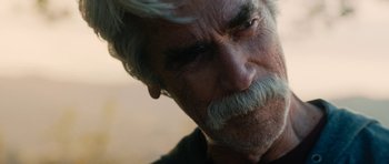 Movie still from “The Hero” (2017), directed by Brett Haley – An older man with a white beard and mustache; Close Up shot, Over the shoulder angle