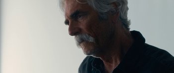 Movie still from “The Hero” (2017), directed by Brett Haley – An older man with white hair and a beard; Close Up shot, Over the shoulder angle