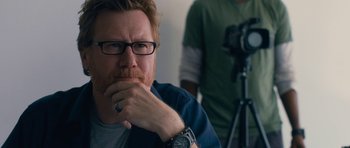 Movie still from “The Hero” (2017), directed by Brett Haley – A person with a camera; Close Up shot, Over the shoulder angle