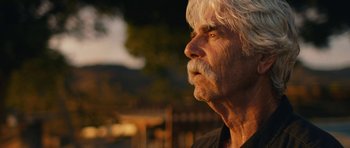 Movie still from “The Hero” (2017), directed by Brett Haley – An older man with a white beard looking up; Close Up shot, Low angle