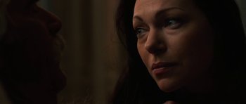 Movie still from “The Hero” (2017), directed by Brett Haley – A woman's face in the dark; Extreme Close Up shot, Over the shoulder angle