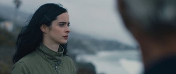 Movie still from “The Hero” (2017), directed by Brett Haley – A woman in a green jacket looking off into the distance; Close Up shot, Over the shoulder angle