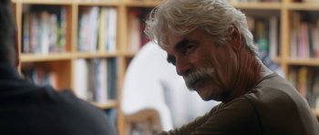 Movie still from “The Hero” (2017), directed by Brett Haley – An older man with white hair looking to his left; Close Up shot, Over the shoulder angle