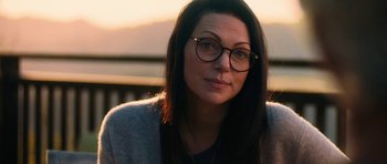 Movie still from “The Hero” (2017), directed by Brett Haley – A person wearing glasses and a sweater; Close Up shot, Over the shoulder angle