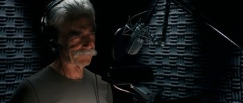 Movie still from “The Hero” (2017), directed by Brett Haley – An older man with a gray beard is in a recording studio; Close Up shot, Low angle