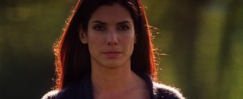 Movie still from “Practical Magic” (1998), directed by Griffin Dunne – A person with long hair; Close Up shot, Low angle