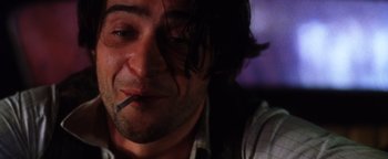 Movie still from “Practical Magic” (1998), directed by Griffin Dunne – A person smoking a cigarette; Close Up shot, Low angle