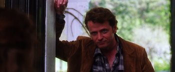 Movie still from “Practical Magic” (1998), directed by Griffin Dunne – A person leaning against a wall; Close Up shot, Low angle