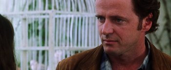 Movie still from “Practical Magic” (1998), directed by Griffin Dunne – A person wearing a jacket; Close Up shot, Low angle