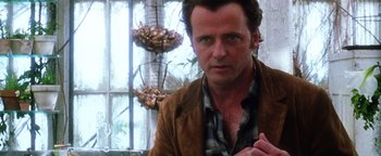 Movie still from “Practical Magic” (1998), directed by Griffin Dunne – A person wearing a jacket; Close Up shot, Over the shoulder angle