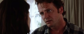 Movie still from “Practical Magic” (1998), directed by Griffin Dunne – A person looking at the camera; Close Up shot, Over the shoulder angle