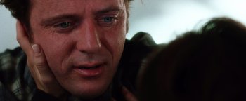 Movie still from “Practical Magic” (1998), directed by Griffin Dunne – A person looking at the camera; Extreme Close Up shot, Over the shoulder angle