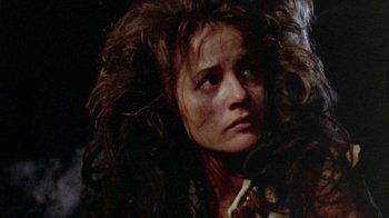 Movie still from “The Hills Have Eyes” (1977), directed by Wes Craven – A person wearing a wig; Close Up shot, Low angle