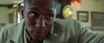 Movie still from “The Hitchhiker's Guide to the Galaxy” (2005), directed by Garth Jennings – A man's eyes and face; Close Up shot, Low angle