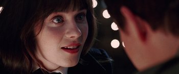 Movie still from “The Hitchhiker's Guide to the Galaxy” (2005), directed by Garth Jennings – A woman's face as she stares at a man; Extreme Close Up shot, Over the shoulder angle