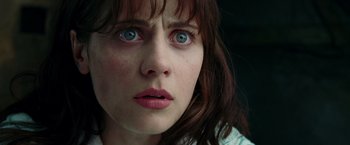 Movie still from “The Hitchhiker's Guide to the Galaxy” (2005), directed by Garth Jennings – A person with blue eyes; Close Up shot, Low angle