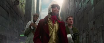 Movie still from “The Hitchhiker's Guide to the Galaxy” (2005), directed by Garth Jennings – A group of men standing next to each other; Medium shot, Low angle