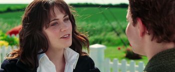 Movie still from “The Hitchhiker's Guide to the Galaxy” (2005), directed by Garth Jennings – A person wearing a white shirt; Close Up shot, Over the shoulder angle