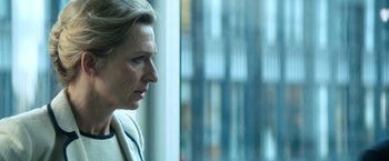 Movie still from “The Hitman's Bodyguard” (2017), directed by Patrick Hughes – A person looking out of a window; Close Up shot, Over the shoulder angle