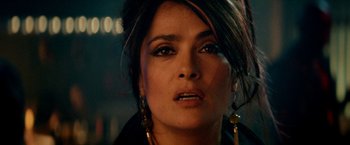Movie still from “The Hitman's Bodyguard” (2017), directed by Patrick Hughes – A person wearing earrings; Close Up shot, Overhead angle