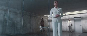 Movie still from “The Host” (2013), directed by Andrew Niccol – A woman standing in front of a mirror in front of a table; Medium shot, Low angle