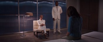 Movie still from “The Host” (2013), directed by Andrew Niccol – A man and a woman in a white suit and a woman in a white suit; Wide shot, Over the shoulder angle