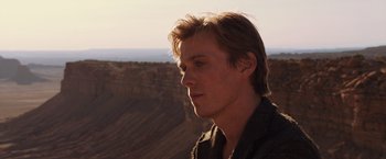 Movie still from “The Host” (2013), directed by Andrew Niccol – A person looking at the camera; Close Up shot, Low angle