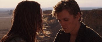 Movie still from “The Host” (2013), directed by Andrew Niccol – A man and a woman face to face on a hill; Close Up shot, Over the shoulder angle