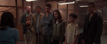 Movie still from “The Host” (2013), directed by Andrew Niccol – A group of young people standing next to each other; Medium shot, Over the shoulder angle
