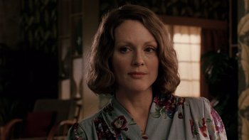 Movie still from “The Hours” (2002), directed by Stephen Daldry – A person with short hair; Close Up shot, Over the shoulder angle