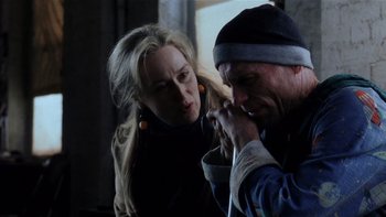 Movie still from “The Hours” (2002), directed by Stephen Daldry – A man and a woman looking at each other; Close Up shot, Over the shoulder angle